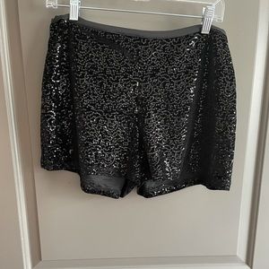 Sequined black mini shorts